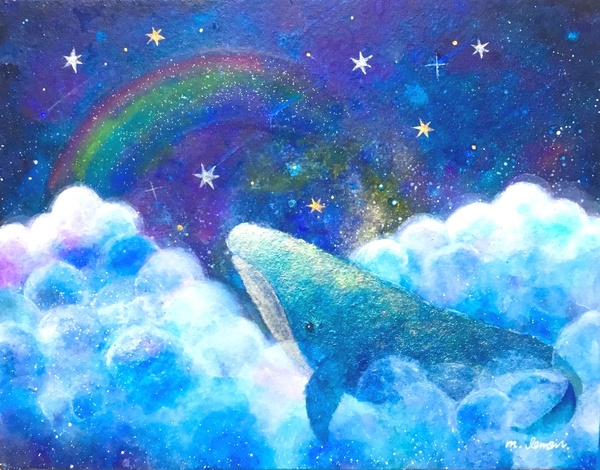 天空の虹を見るクジラ