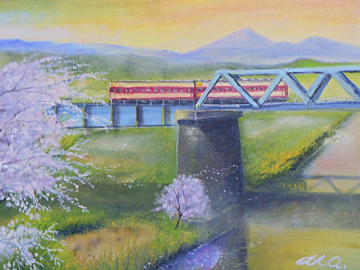 黄昏の電車鉄橋を渡る