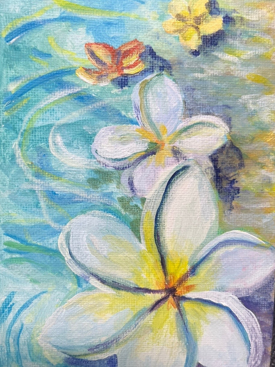 浜辺に浮かぶ花