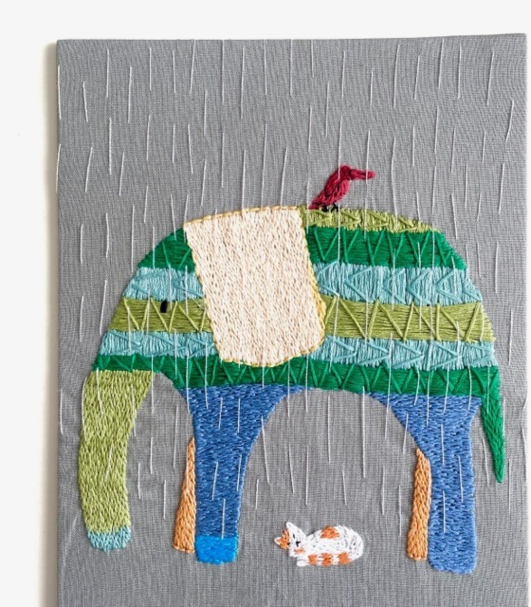 雨の日の象と赤い鳥